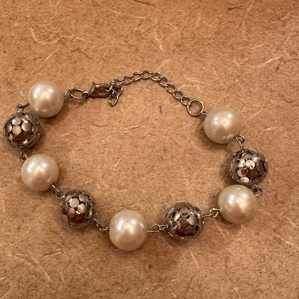 Metal bead and faux pearl bracelet